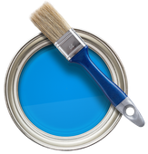 A blue paint can with a brush in it