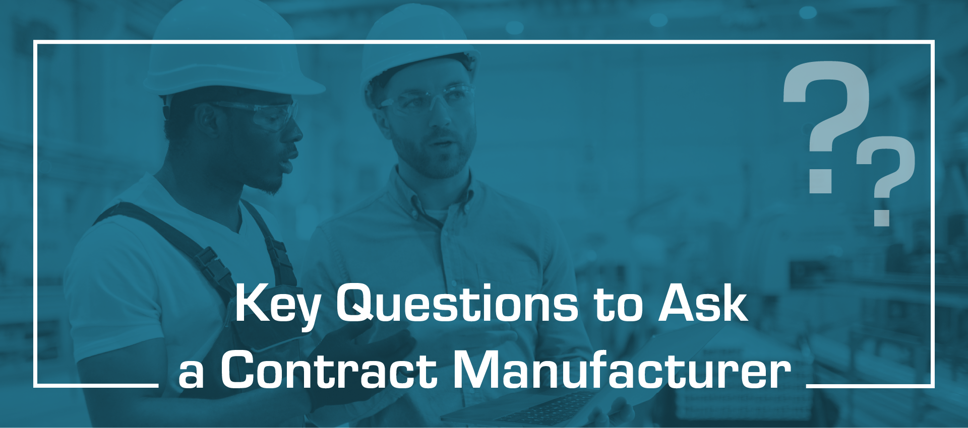 Two men in hard hats, discussing in a factory setting. Text overlay: 