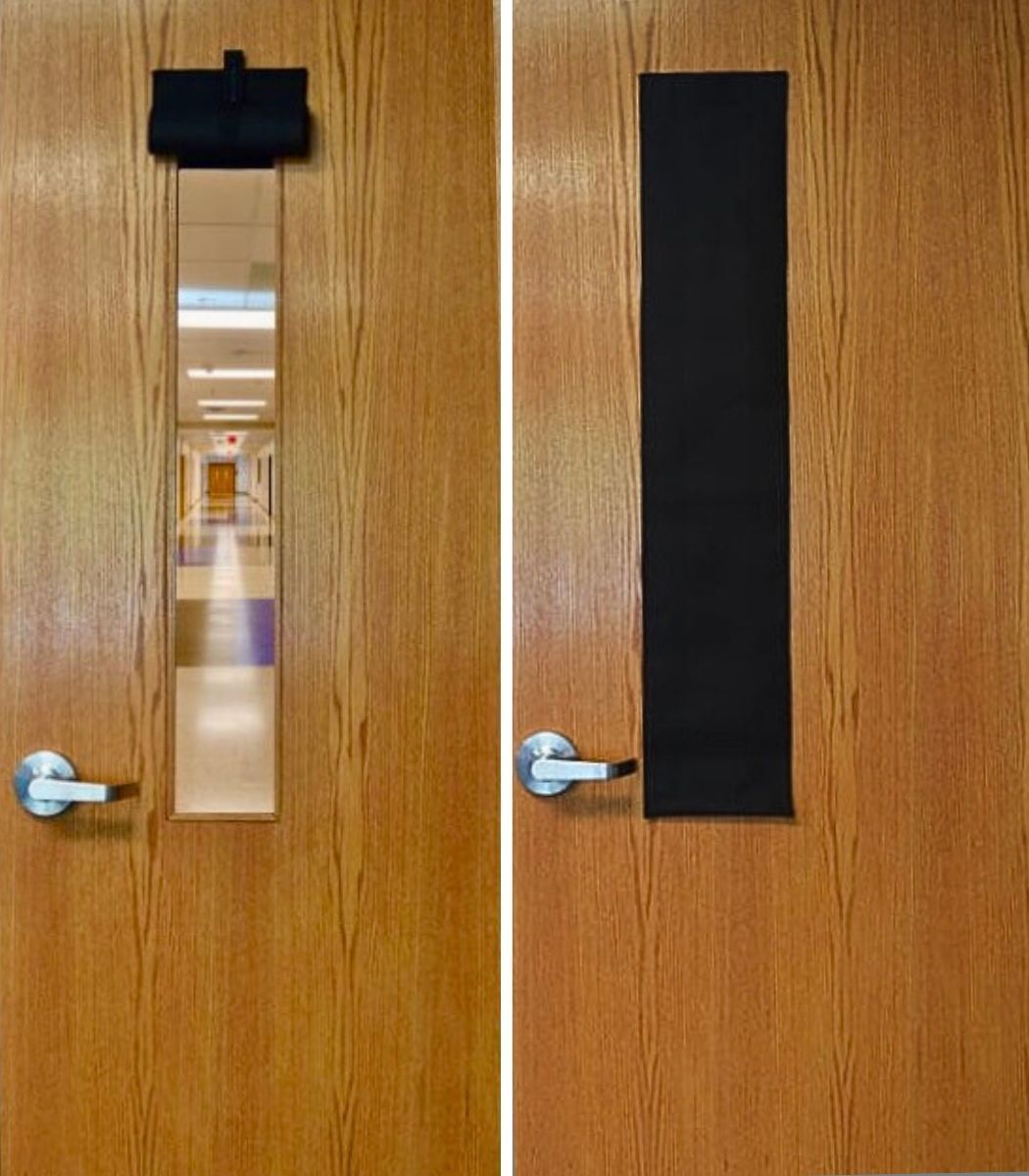 A wooden door with a black stripe on it