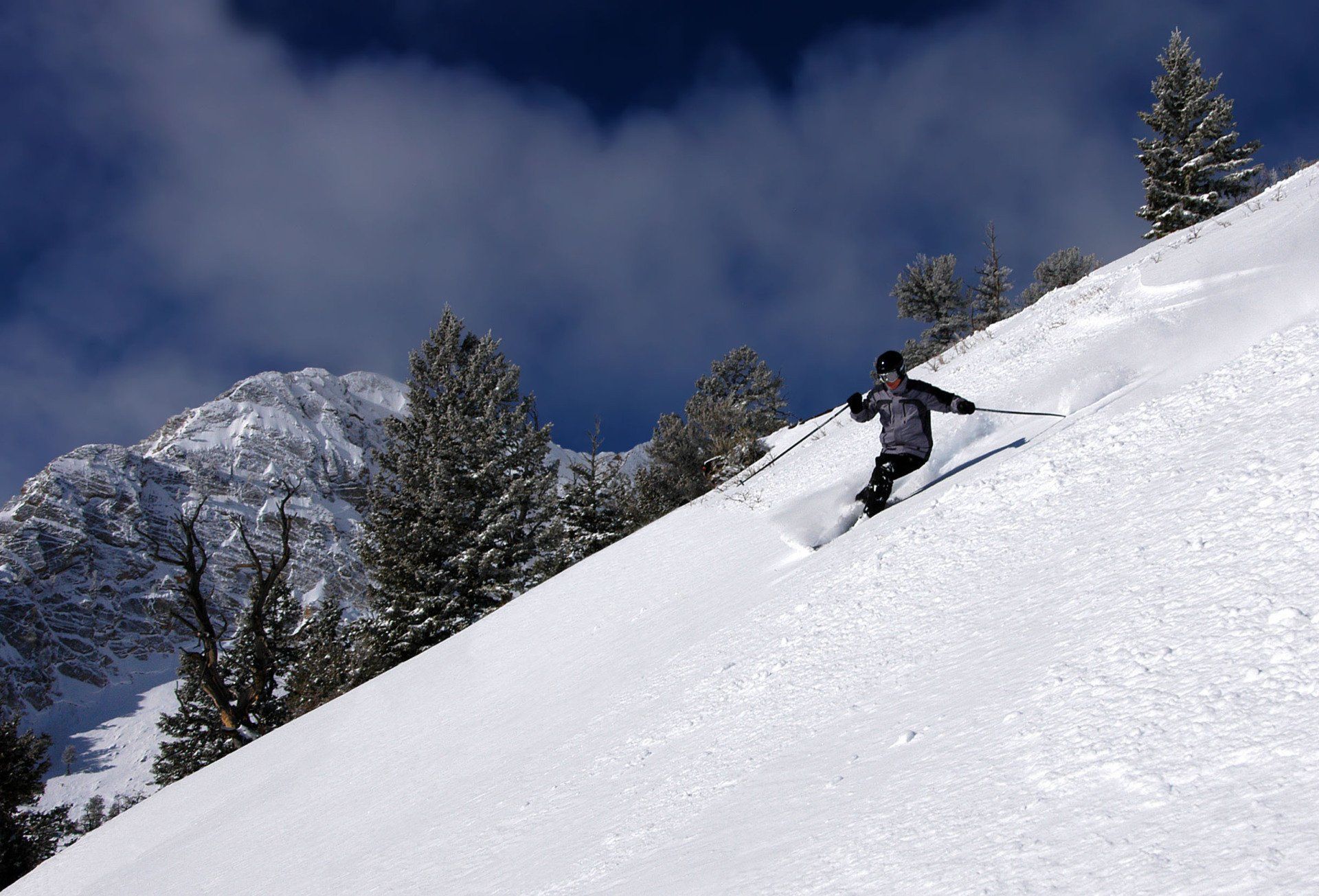Man skiing down mountain