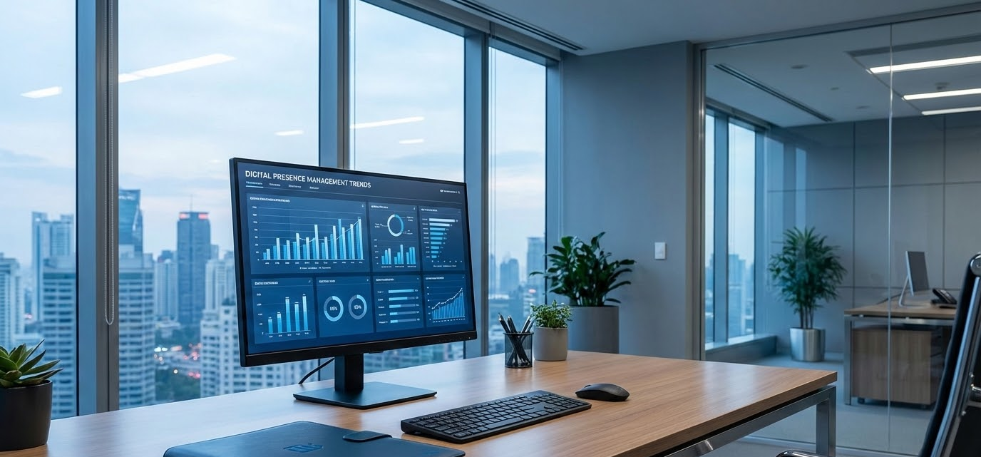 Monitor displaying data on a desk with keyboard and mousepad in an office setting.