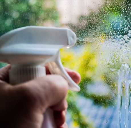 Spraying the Window — SE Wisconsin — Chuck’s Window Cleaning