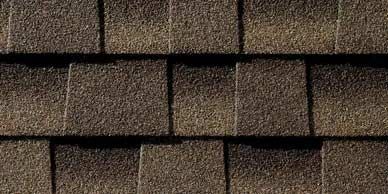 Close-up of brown asphalt roof shingles.