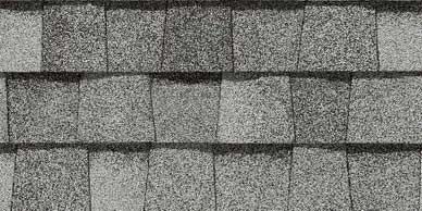Close-up of gray asphalt roof shingles.