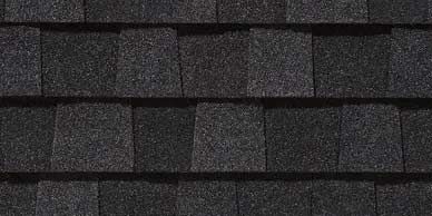 Dark gray asphalt roof shingles.