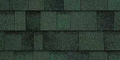 Dark green asphalt roof shingles.