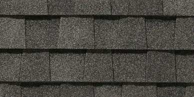 Gray asphalt roof shingles.