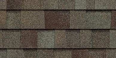 Close-up of brown and gray roof shingles.
