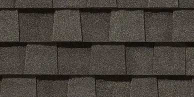 Dark gray asphalt roof shingles.