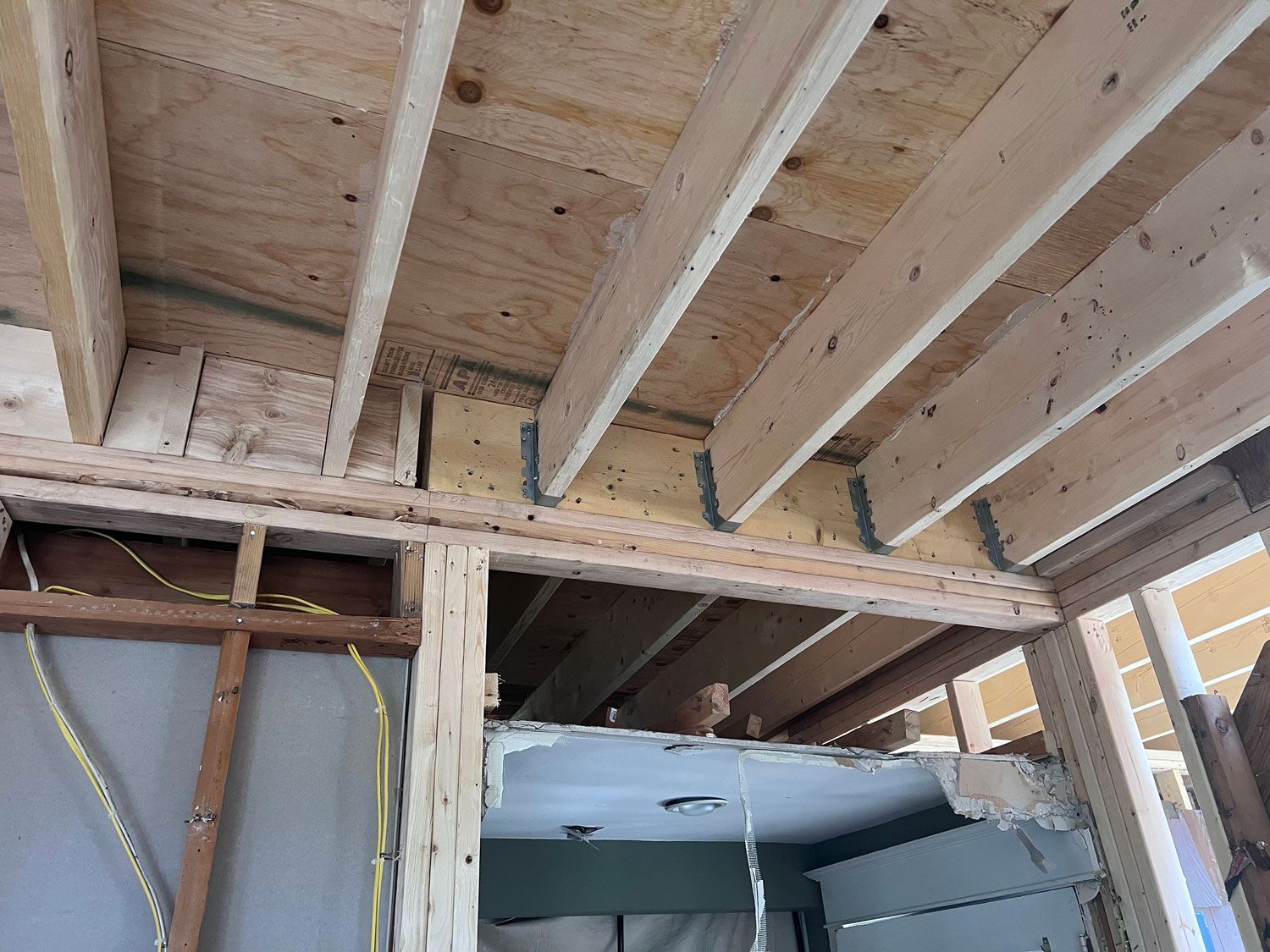 Wooden ceiling framing during construction.