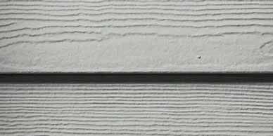 Gray siding with horizontal wood grain texture.