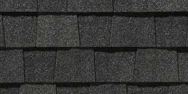 Dark gray asphalt roof shingles.