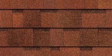 Close-up of red asphalt shingles.