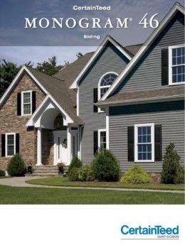 Cover of a brochure showing a house with Monogram 46 siding. Gray siding with black shutters and a stone facade.