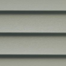 Greenish-gray horizontal siding on a building exterior.