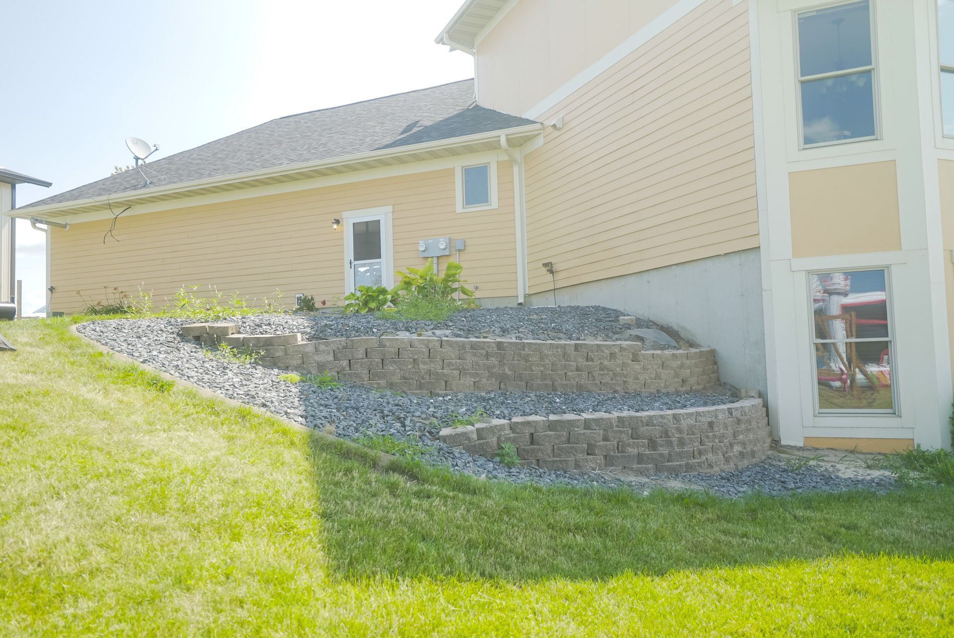 Before Retaining Wall — Holmen, WI — Brothers Lawn Care LLC