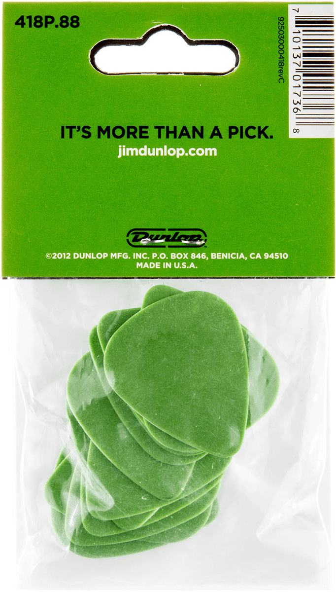 Een verpakking groene gitaarplectrums met een schildpad erop