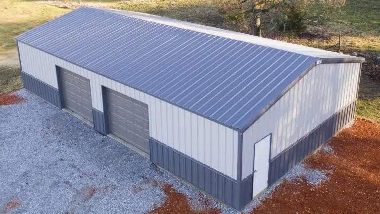 An aerial view of a metal building with two garage doors.