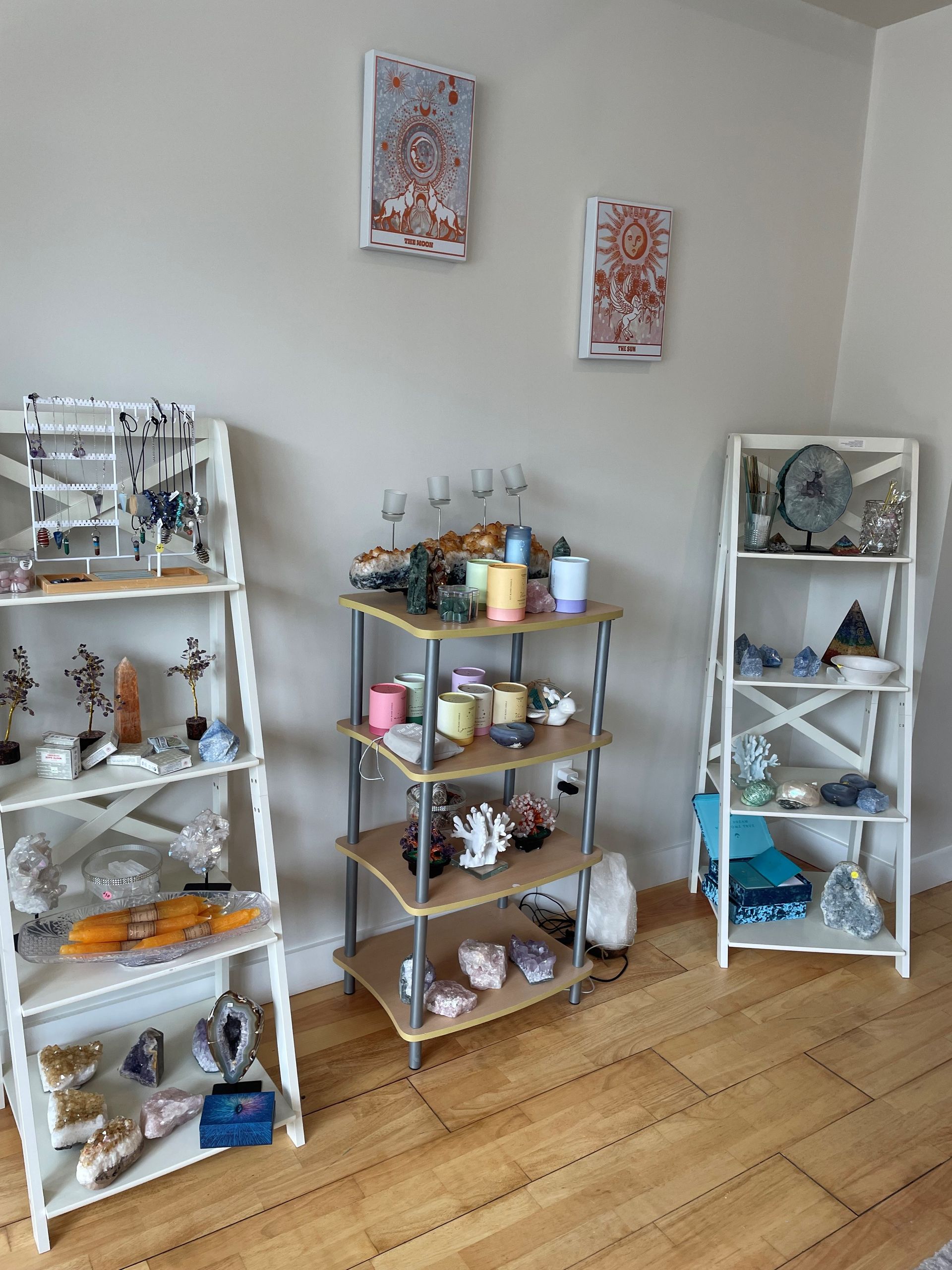 A room with shelves filled with candles and other items