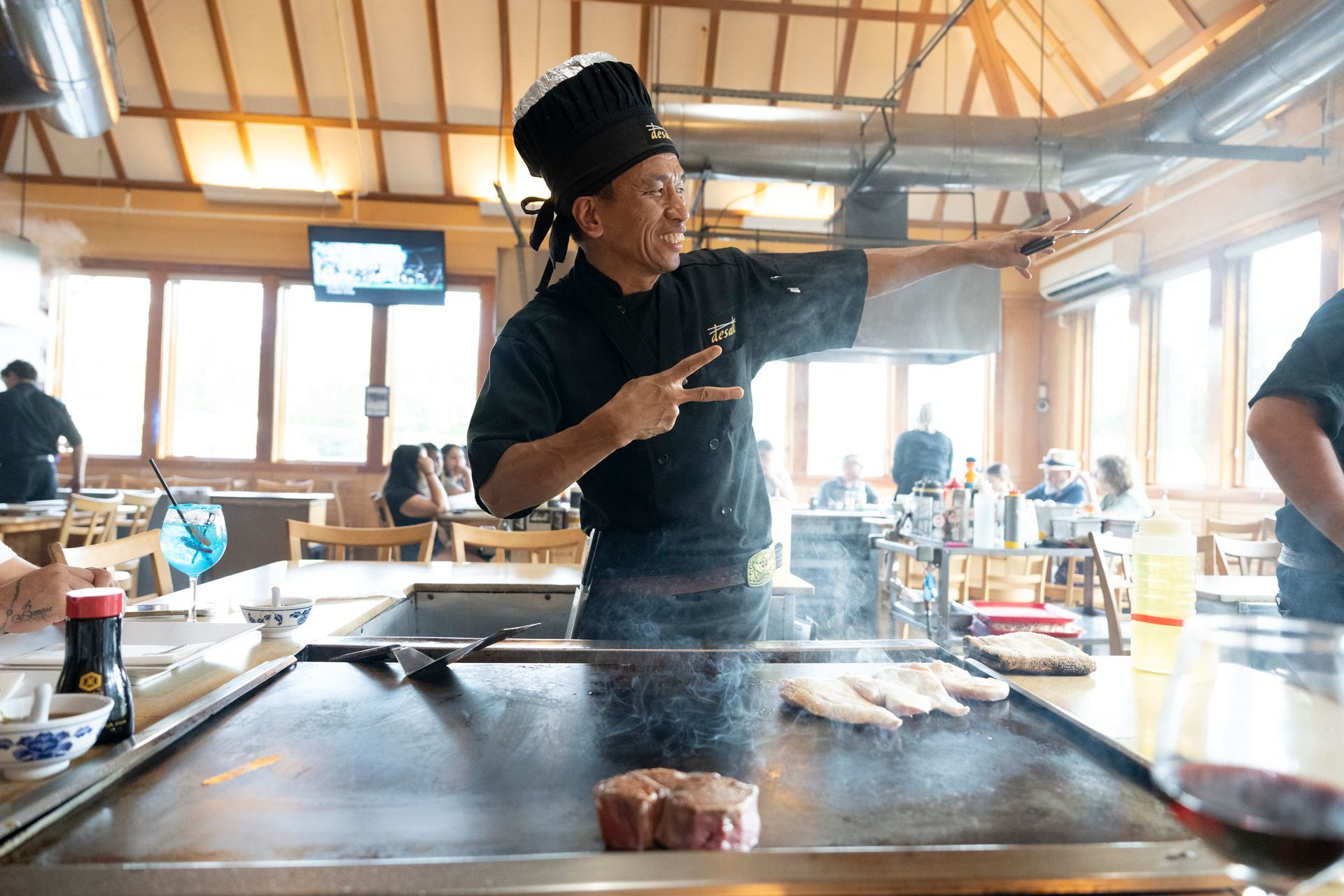Hibachi chef posing for a picture at the hibachi grill at desaki Restaurant in Swiftwater, PA