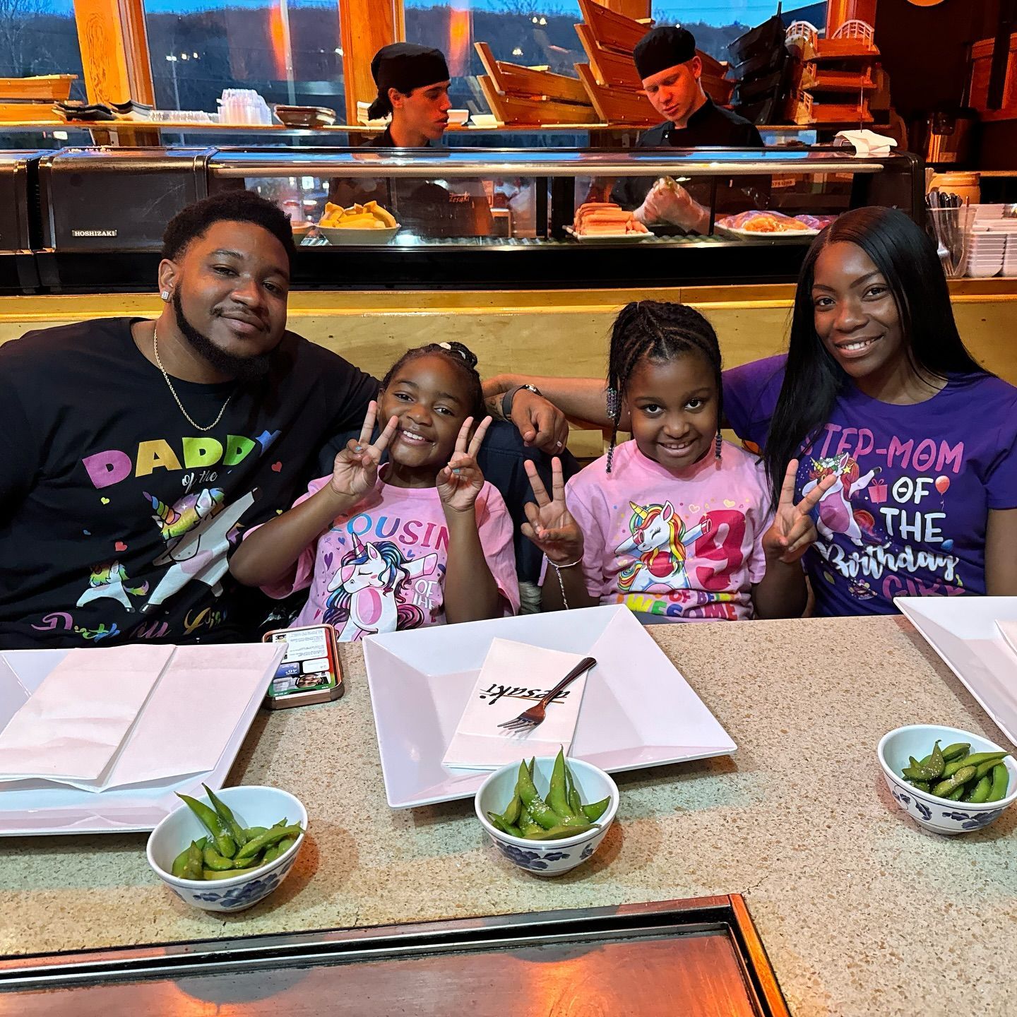 A family of 4 celebrating their daughter's birthday at desaki Restaurant