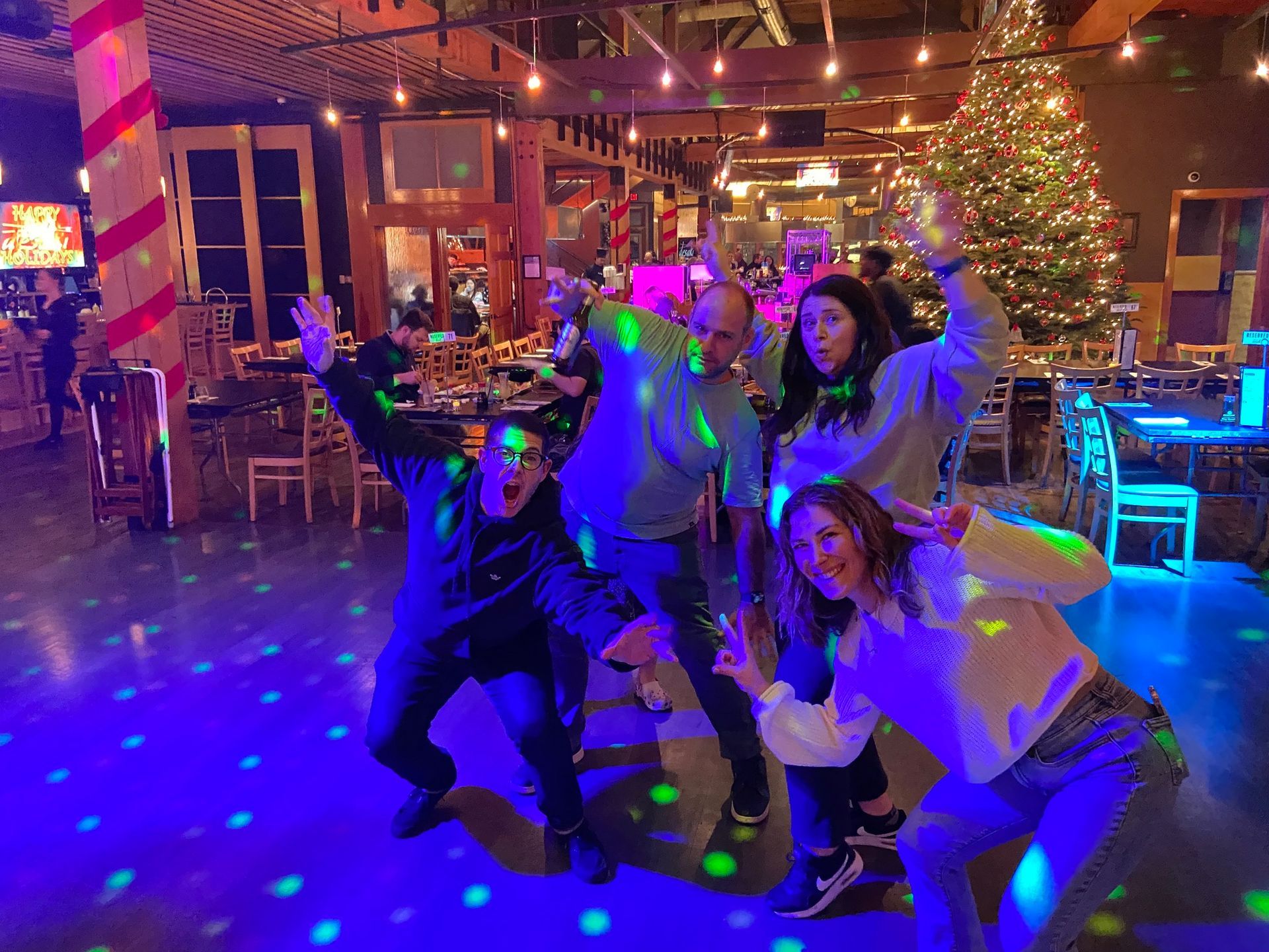 Friends having fun on the dance floor at desaki