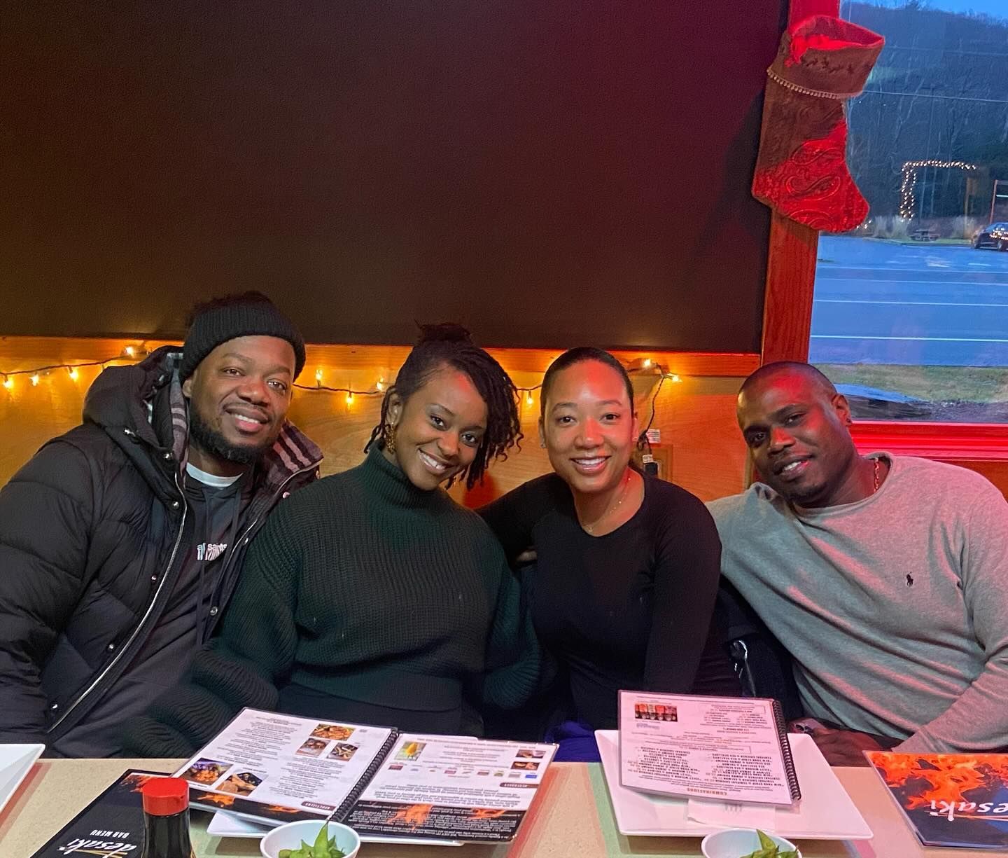 A group of people are posing for a picture at desaki