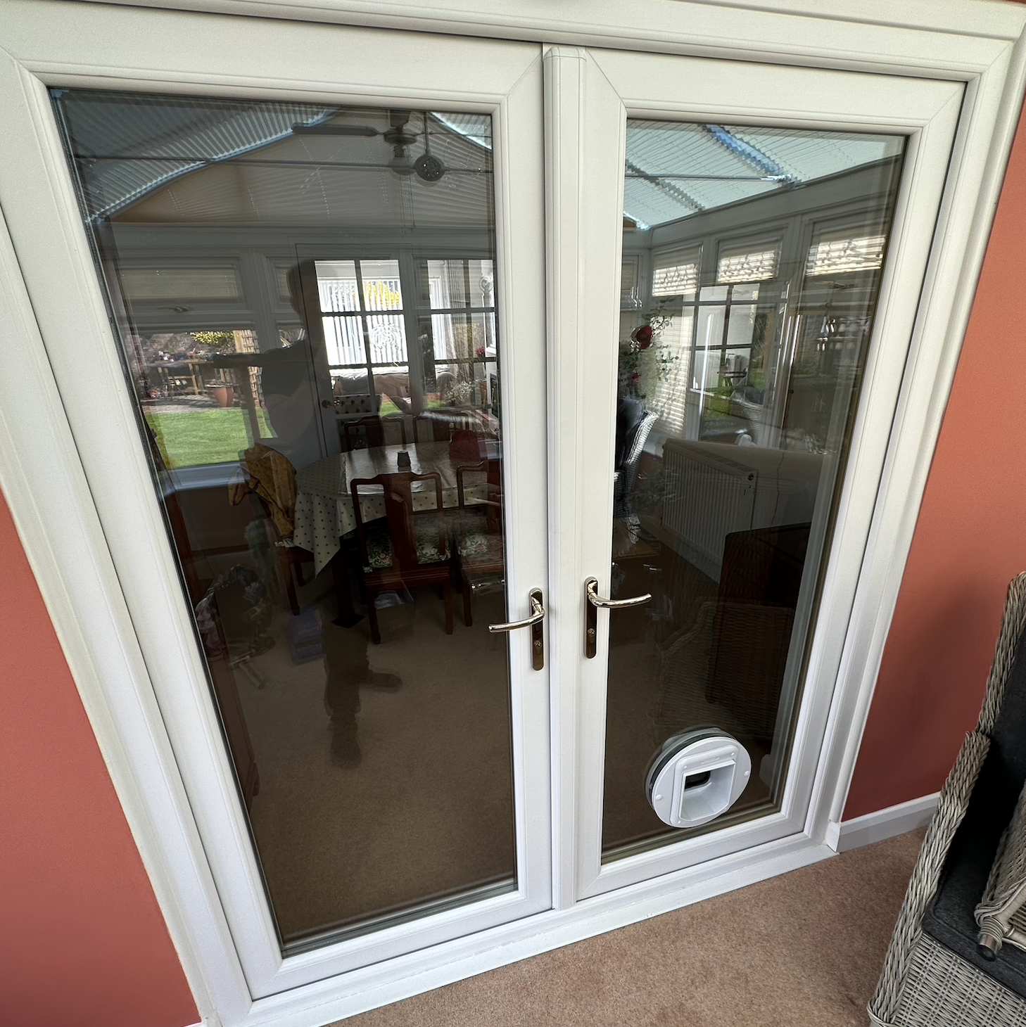 A UPVC french door after we have added a cat flap.