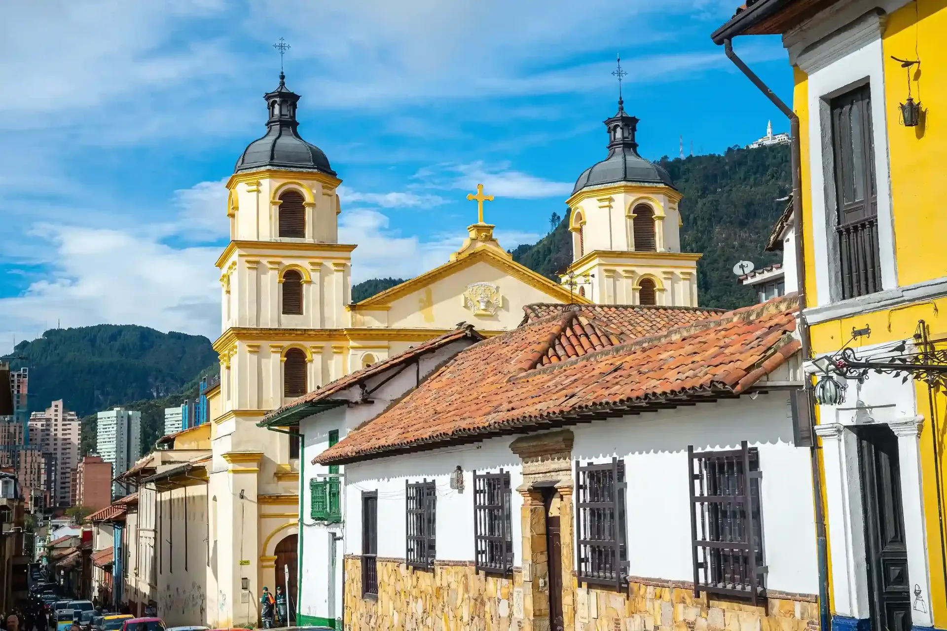 Colonial church in Bogotá, historic architecture with mountains in the background—one of the best things to do in Bogotá to explore the city.