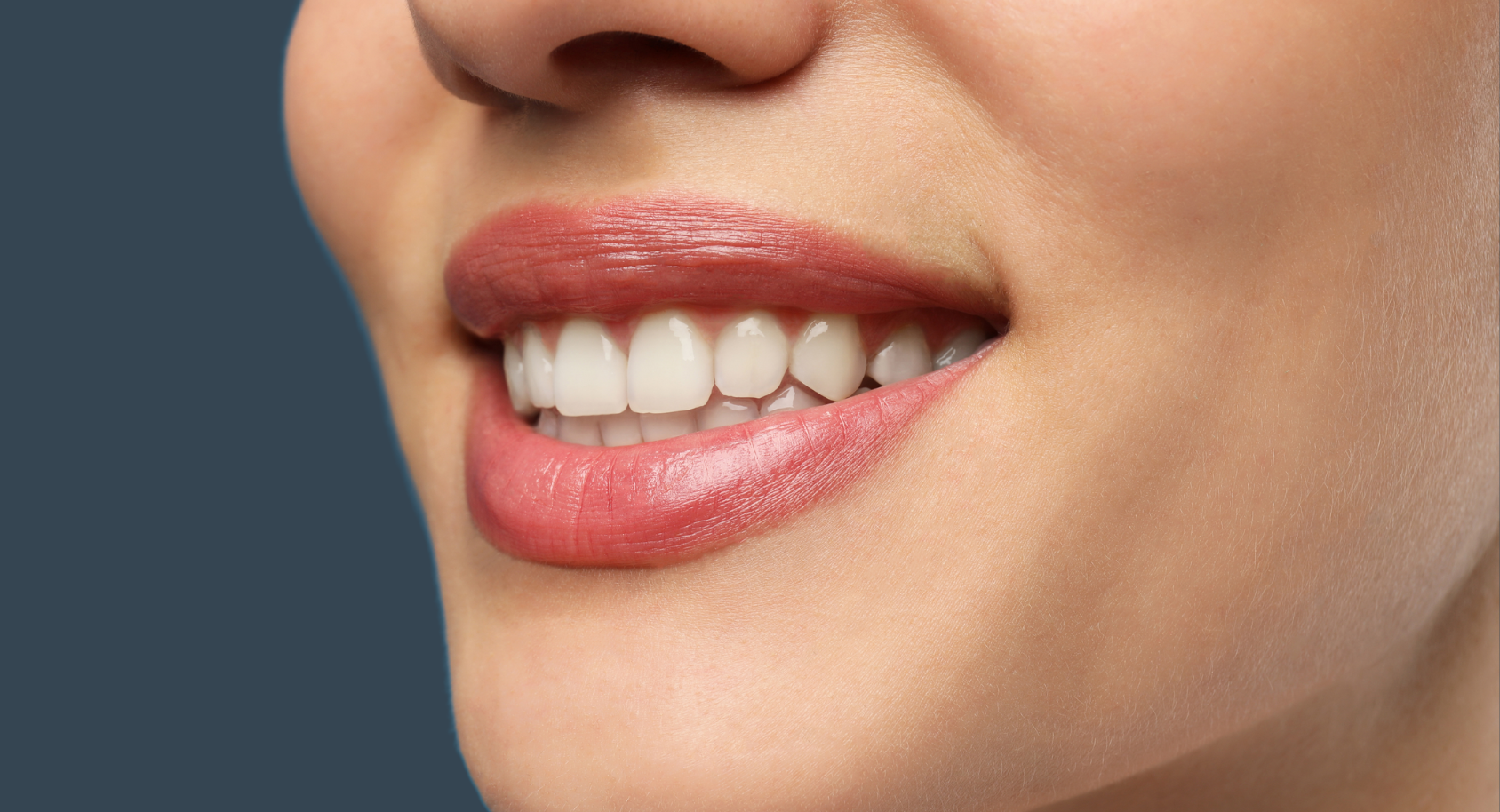 woman smiling baring her teeth