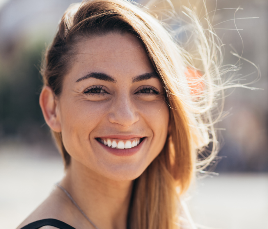 Woman with long blonde hair smiling