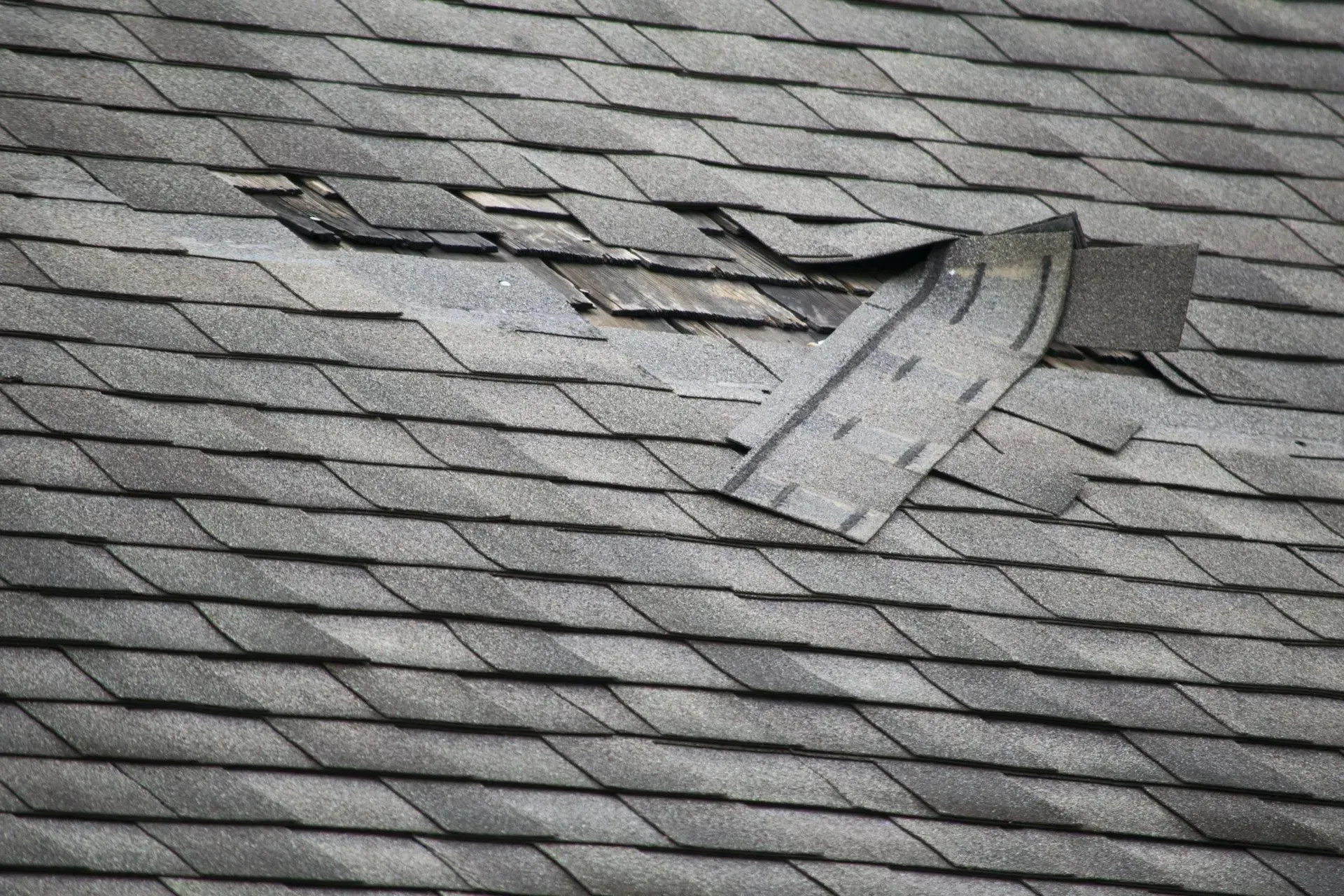 A close up of a roof with a hole in it.