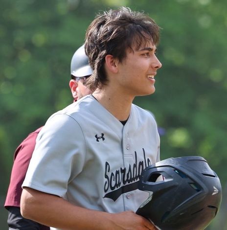 A baseball player is getting ready to hit the ball. Bret Hole @bretbaseball