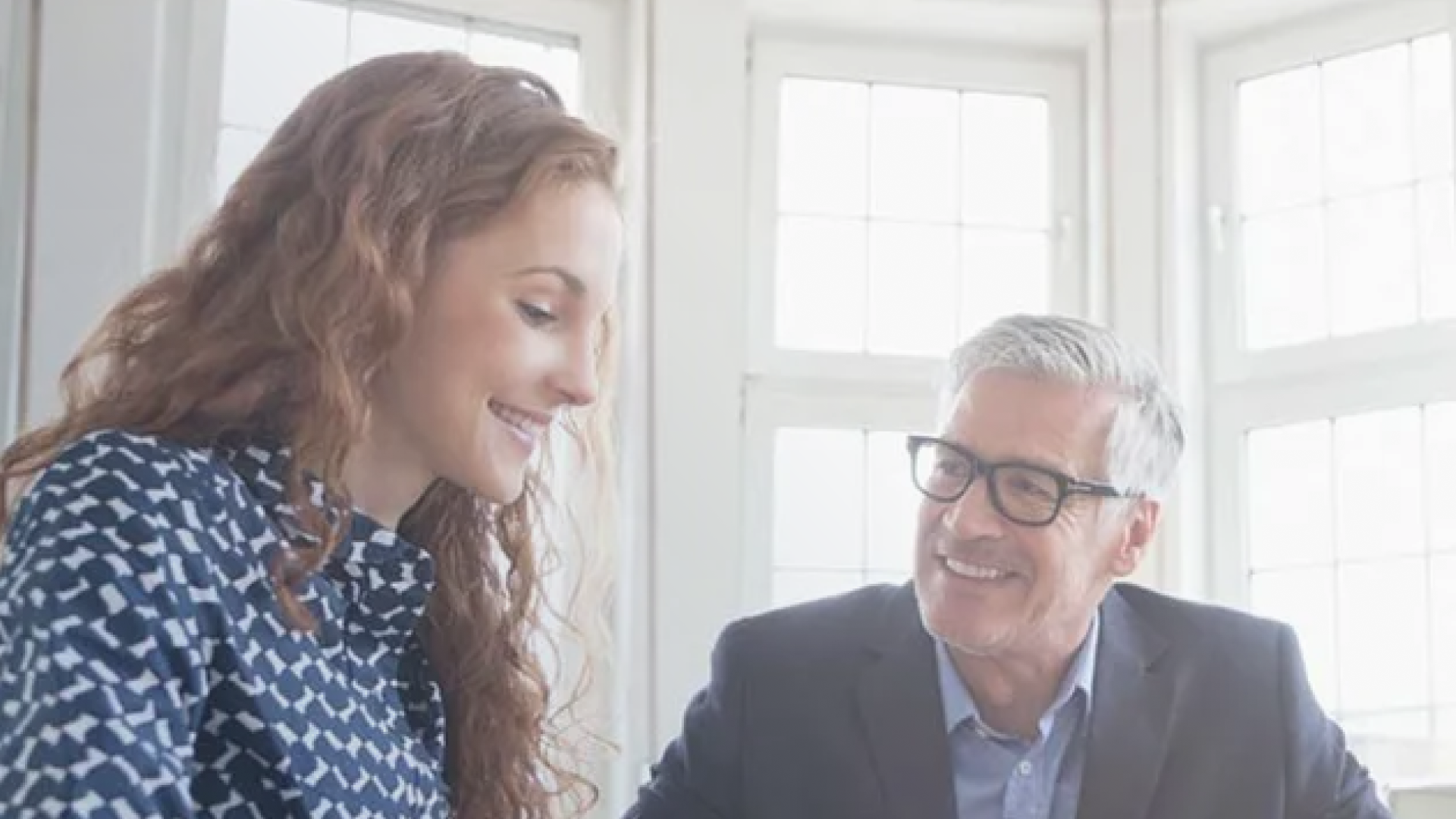 Two business people talking