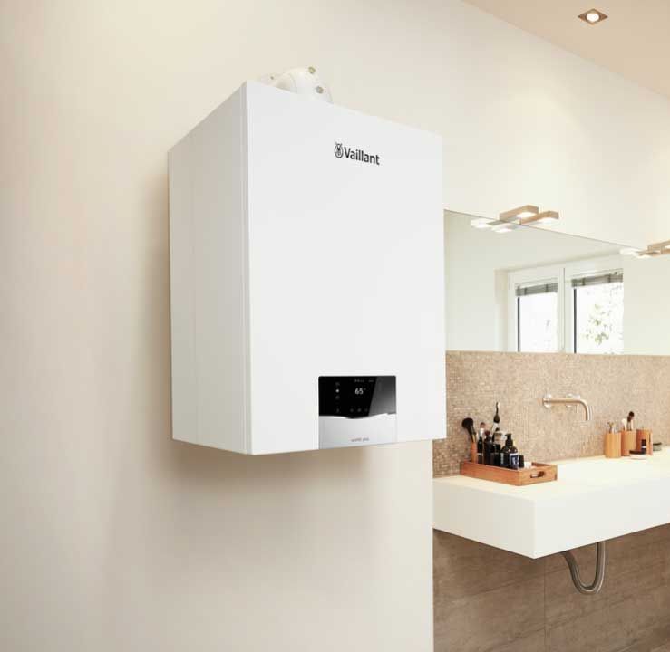 Et badeværelse med et vaillant-apparat på væggen