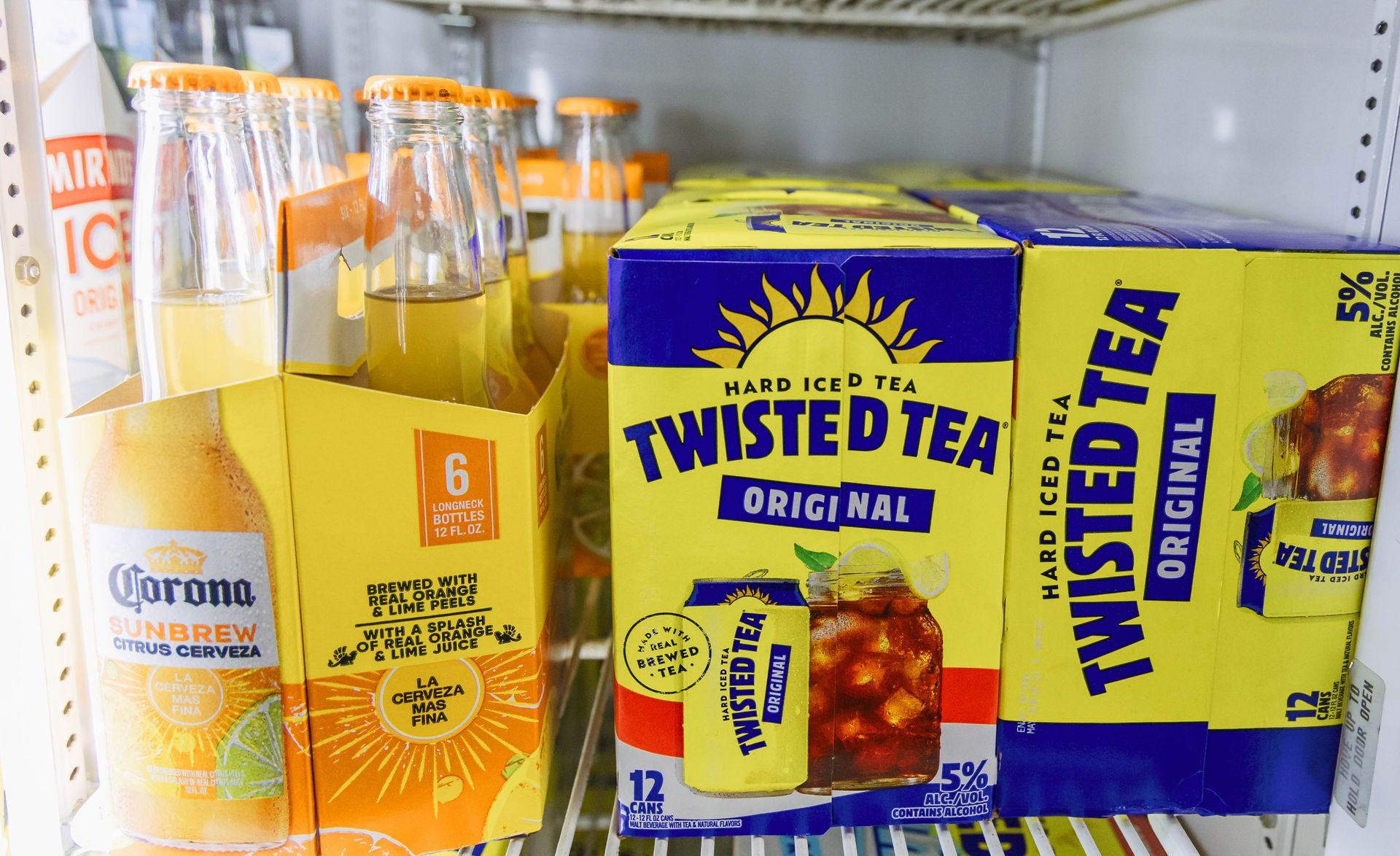 Cooler filled with Twisted Tea and Corona beverages.