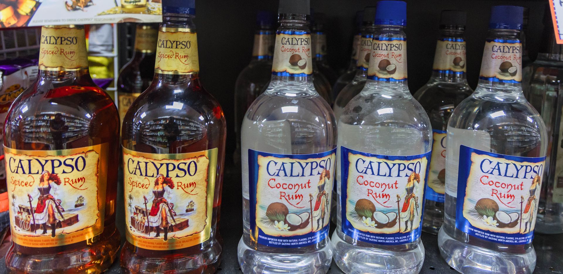 Bottles of Calypso rum on a shelf in a store. There are different varieties.