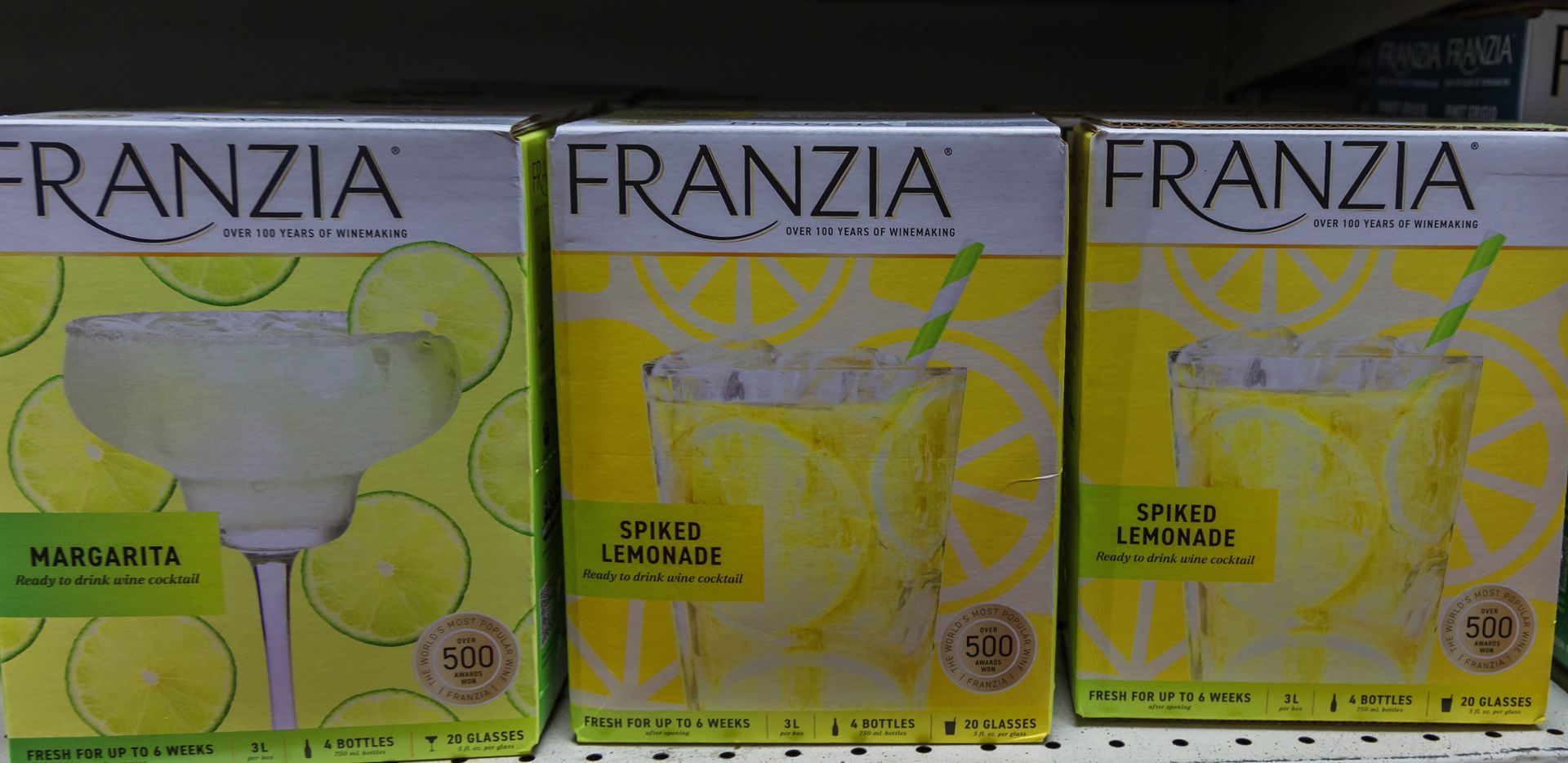 Boxes of Franzia margarita and spiced lemonade.