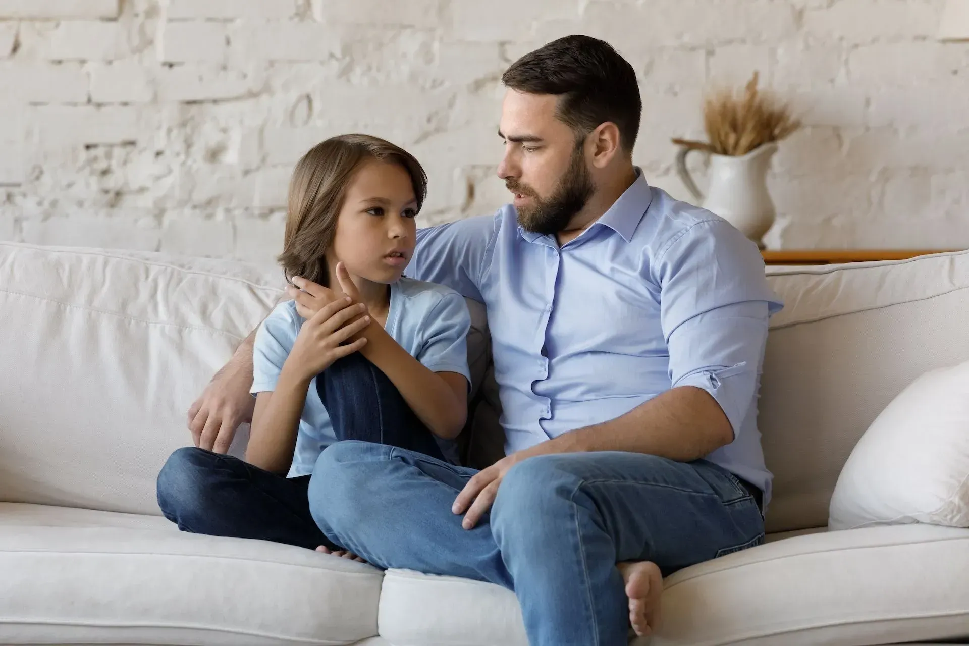 A father and his son is having a conversation