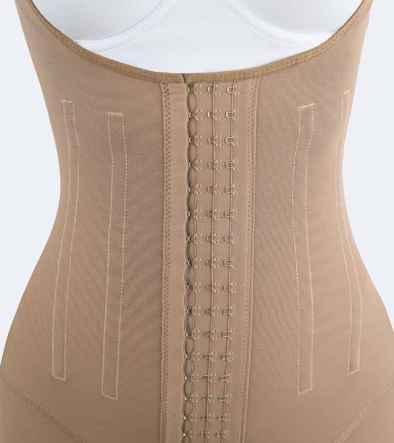 Tan shapewear bodysuit with hook-and-eye closure down the front, providing torso compression.