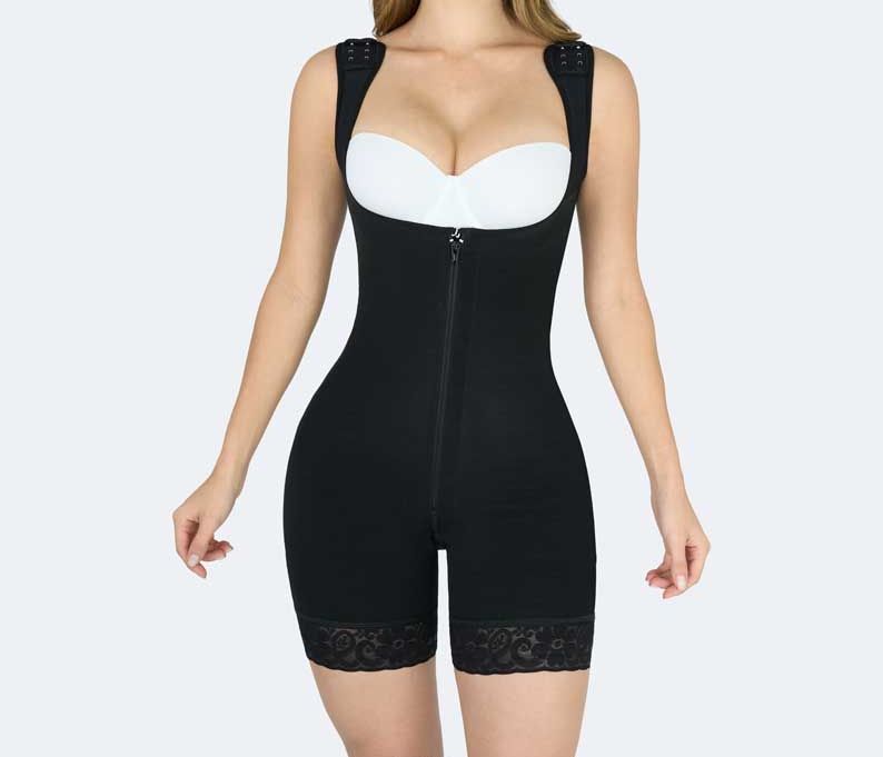 Woman wearing a black full body shapewear with a zipper and lace trim.