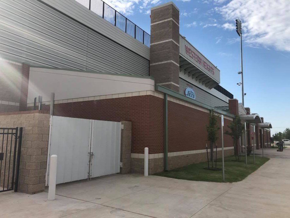 Man Painting Wall — Oklahoma City, OK — Sooner Pride & Power Washing