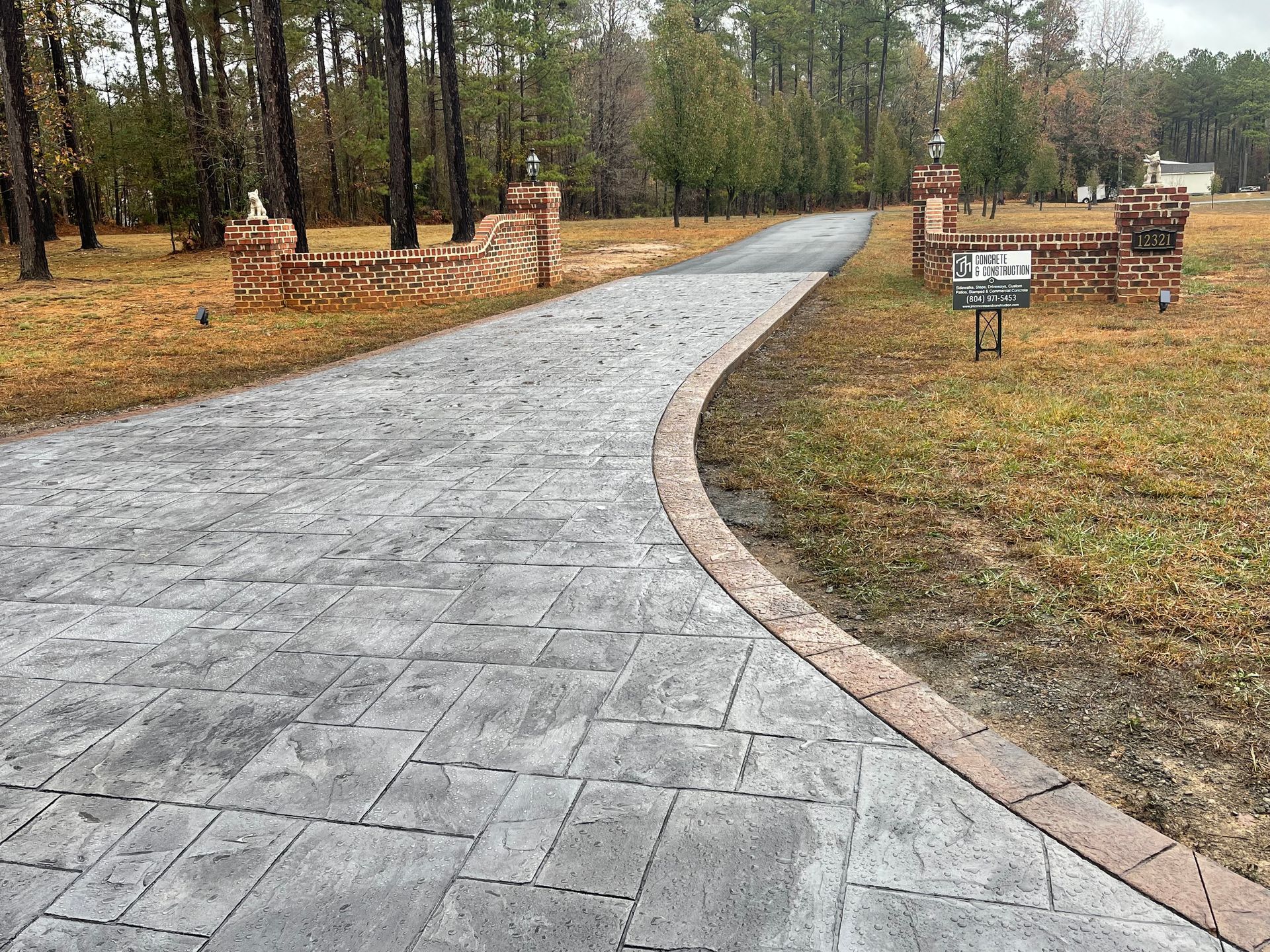 There is a mailbox on the side of the road.