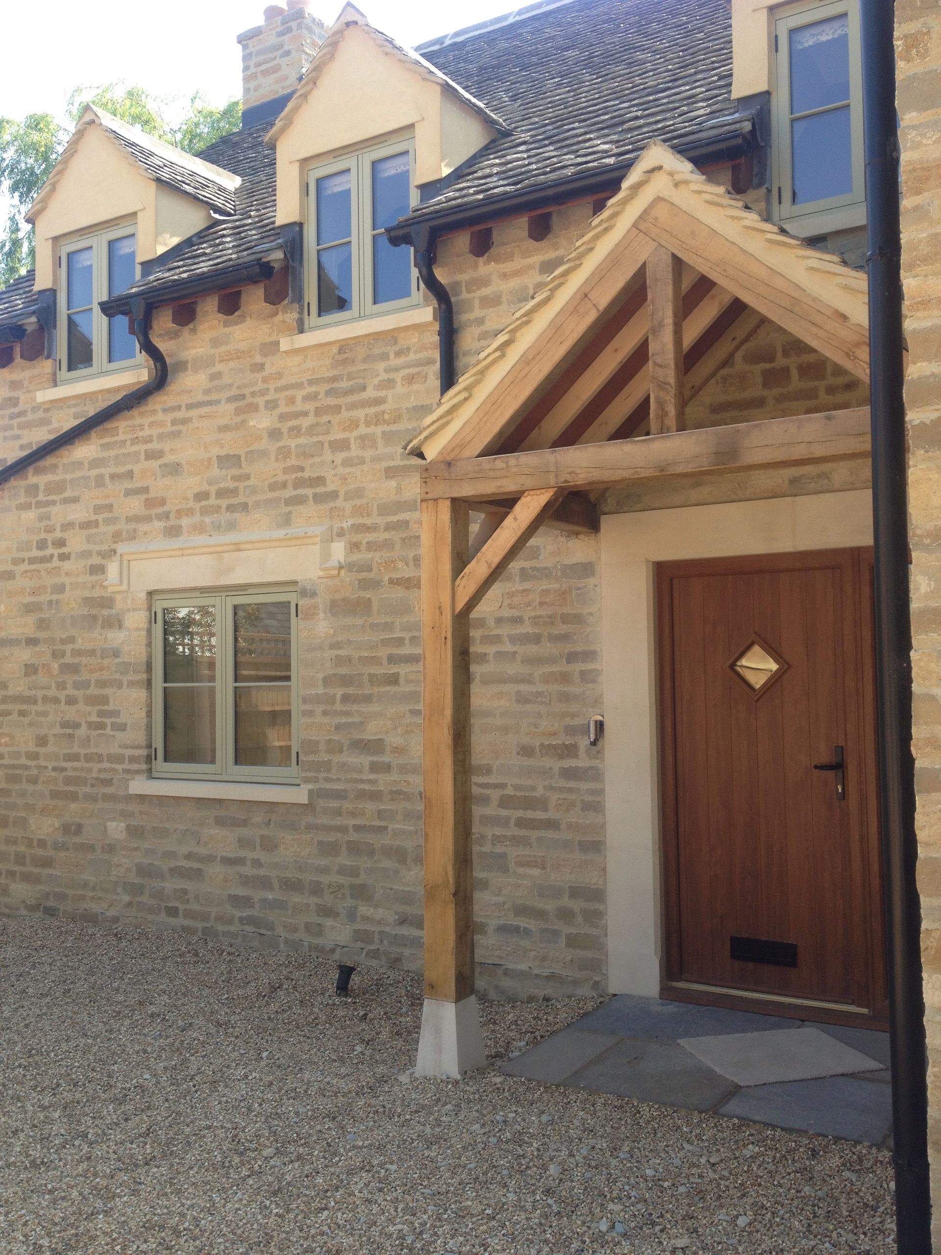 Heritage stone property with black guttering.