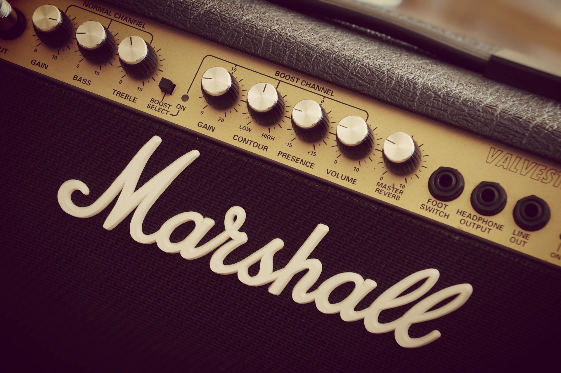 A close up of a marshall guitar amplifier