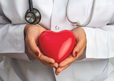 Doctor Holding A Heart Shape - Melbourne, FL- Verus Health Partners
