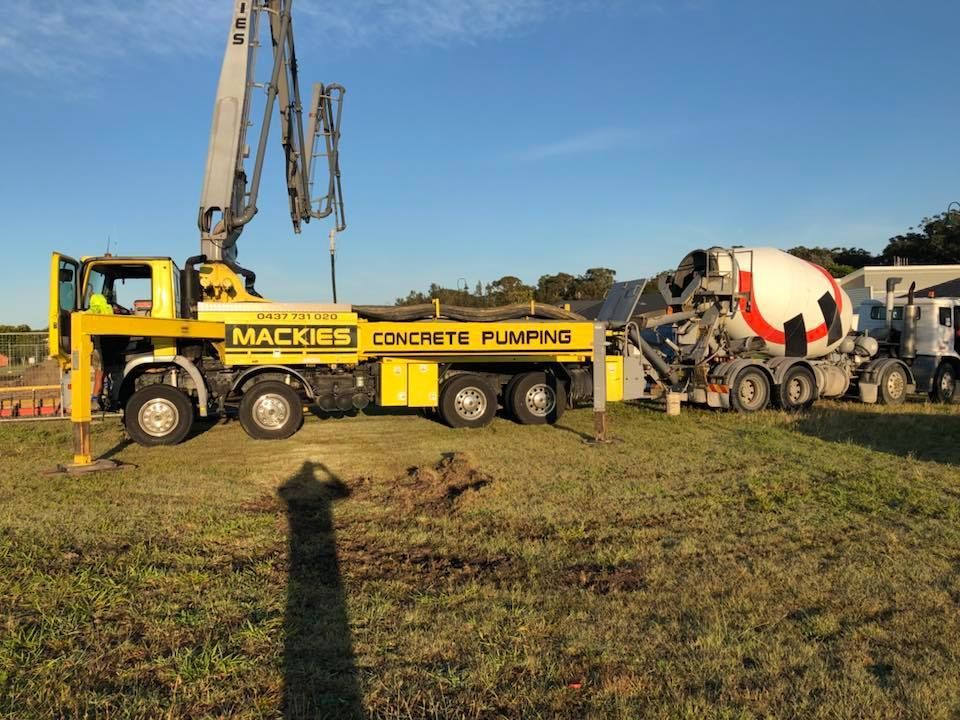 Concrete Pumping Truck on the Field — Mackie’s Concrete Pumping in Pampoolah, NSW