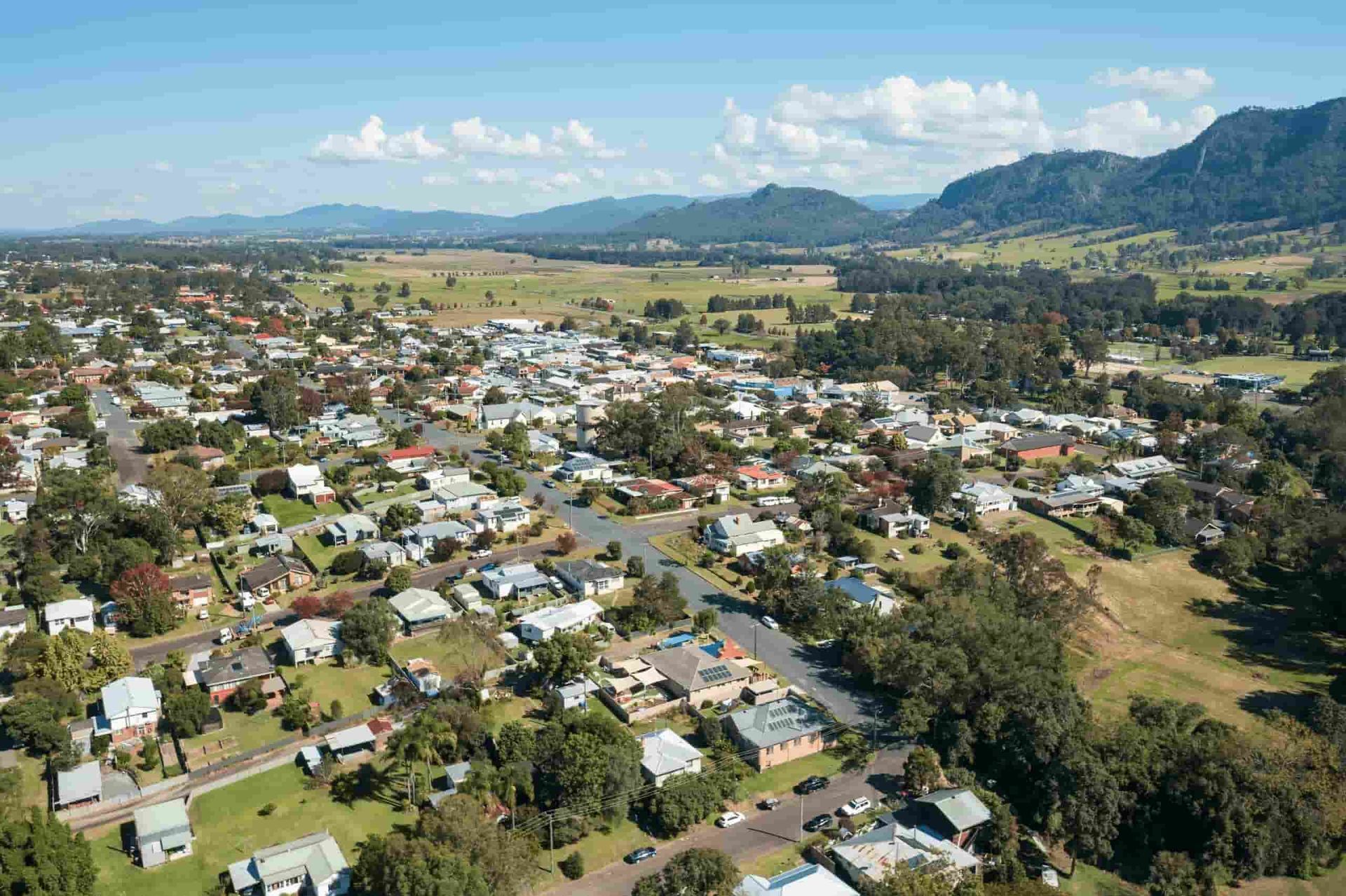 An Aerial View of a Small Town With Mountains in the Background — Mackie's Concrete Pumping In Gloucester, NSW
