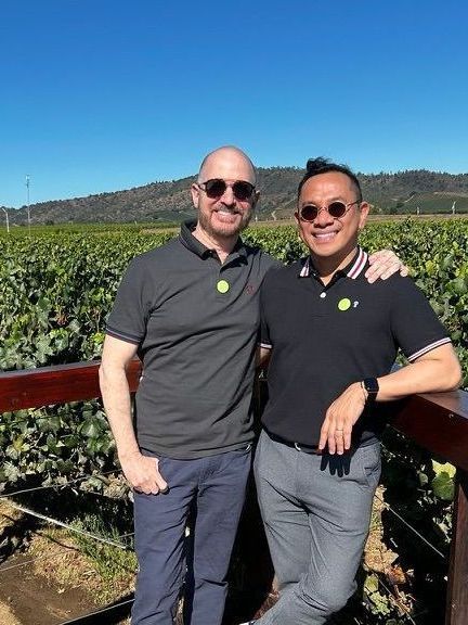 Gay couple in chilean vineyards