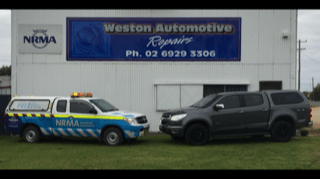 Weston Automotive Repairs vehicle parked outside the building